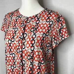 Dana Buchman Capped Sleeves Cream, Black, and Orange Top Size Medium